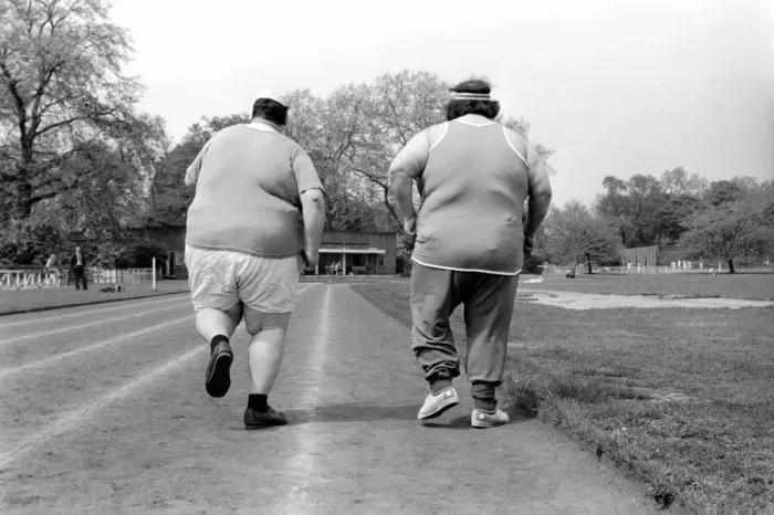 Framed Print : Jogger-nauts: John Robinson sports writer with Colin Taylor jogging in Battersea Park Framed Print : Jogger-nauts: John Robinson sports writer with Colin Taylor jogging in Battersea Park