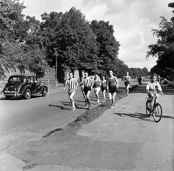 Joggers in Hampstead, north London. 24th September 1954
