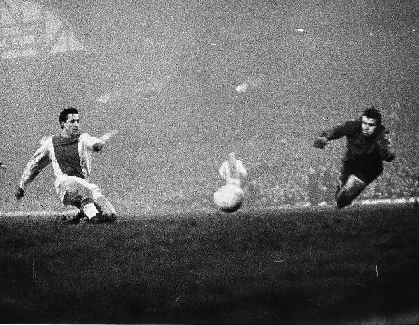 Johan Cruyff of Ajax scores past Tommy Lawrence 1966