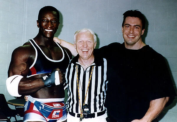John Anderson referee from television programme Gladiators with Shadow and Trojan
