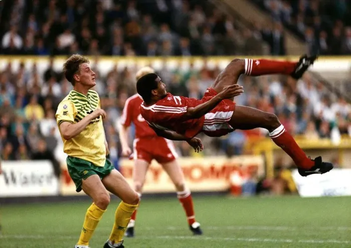 Framed Print : John Barnes of Liverpool FC tries a spectacular overhead kick watched by Norwich City Framed Print : John Barnes of Liverpool FC tries a spectacular overhead kick watched by Norwich City