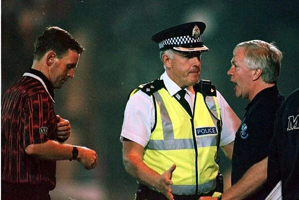 John Blackley St Johnstone assistant manager 20  /  8  /  97 is spoken to by a policeman