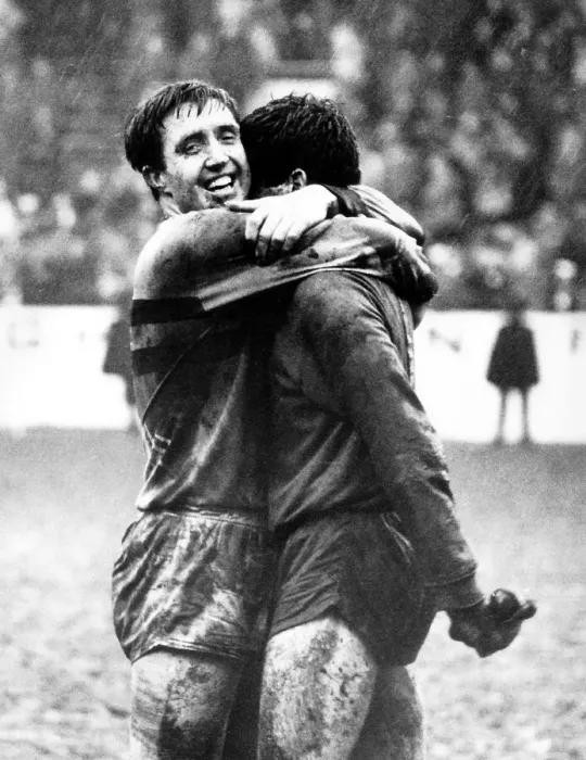 Framed Print : John Bond hugs goalkeeper Jim Standen after West Ham had beaten Manchester United in