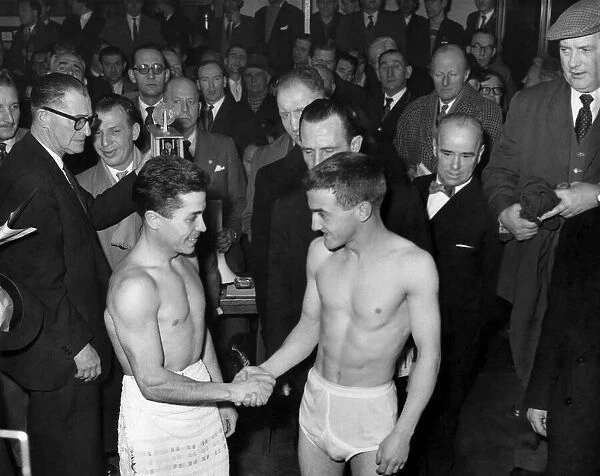 John Caldwell (right) shakes hands with young Martin, the Spanish boxer