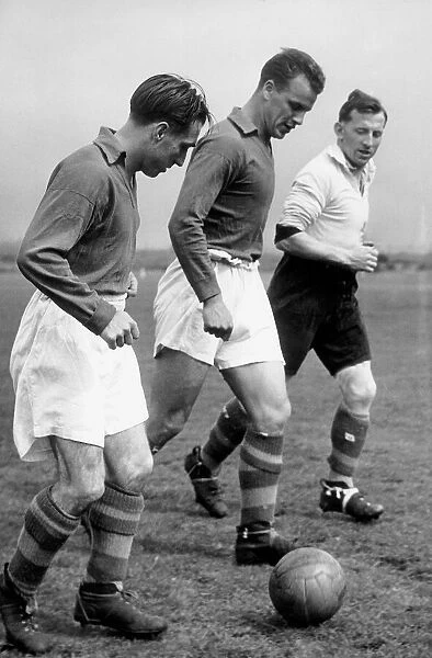 John Charles centre of Leeds United training with two colleagues, 1954