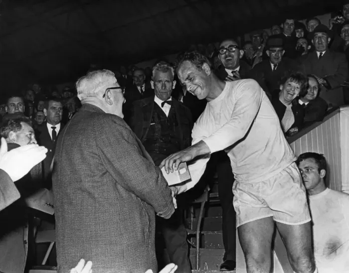 Framed Print : John Charles, Player Manager of Hereford United receives Welsh Cup Runners Up trophy Framed Print : John Charles, Player Manager of Hereford United receives Welsh Cup Runners Up trophy