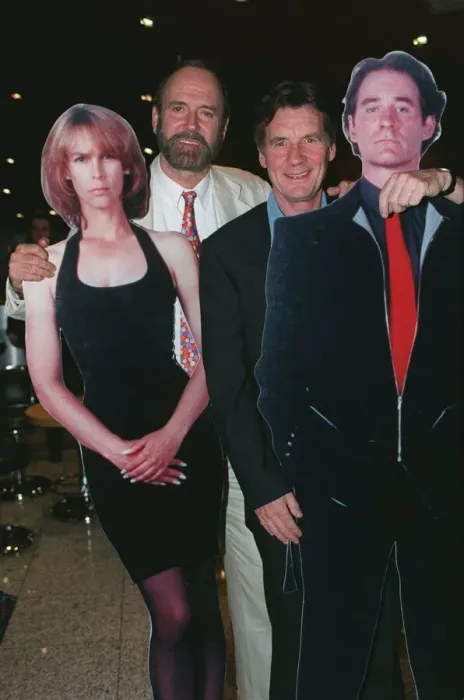 Framed Print : John Cleese and Michael Palin with cardboard cut-outs of Jamie Lee-Curtis Framed Print : John Cleese and Michael Palin with cardboard cut-outs of Jamie Lee-Curtis