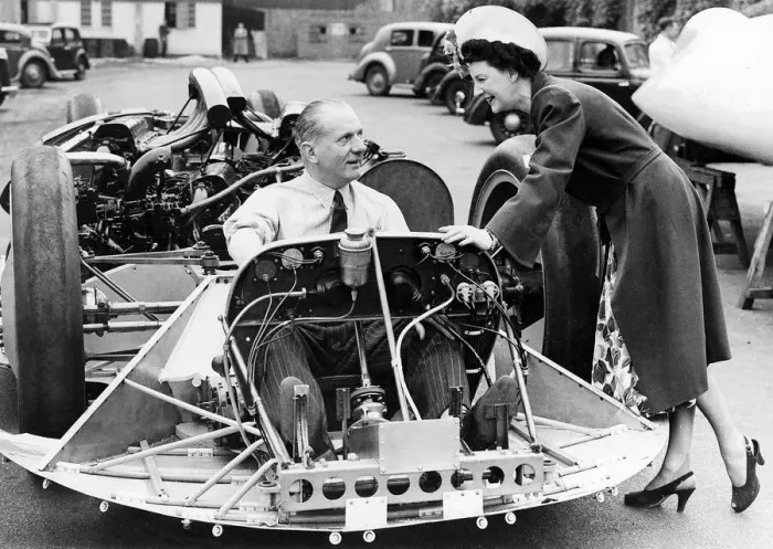 Framed Print : John Cobb June 1947 seated in the chassis of his railton Mobil special talks with