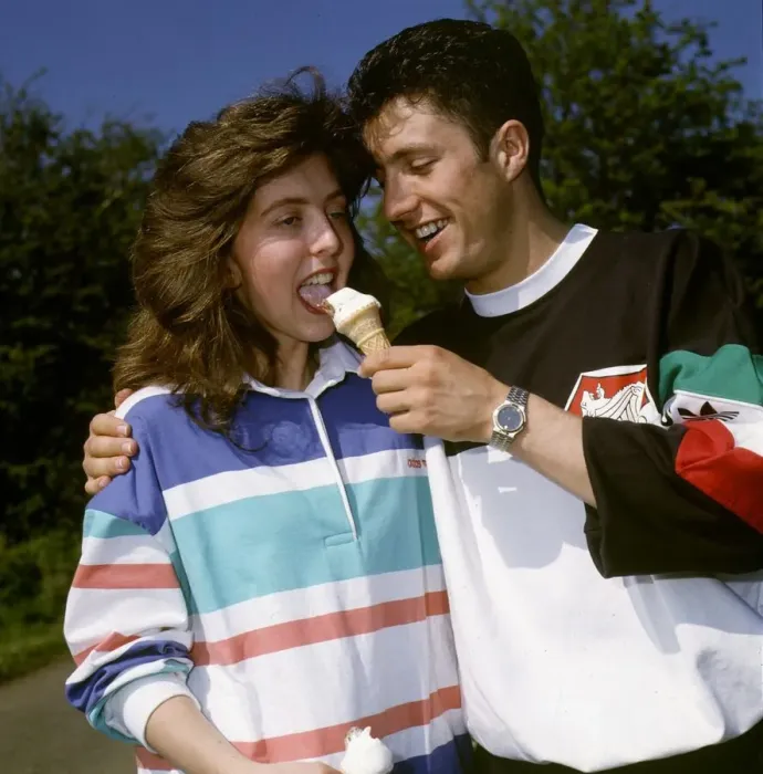 Framed Print : John Collins feeds ice cream cone to Susan Allan May 1990