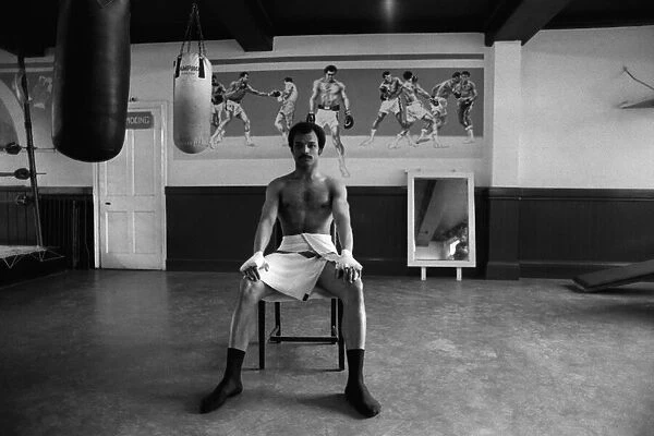 John Conteh in his boxing club having a rest from training