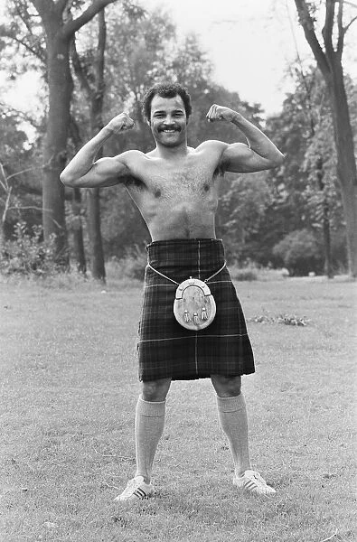 John Conteh gets the Scottish flavour on Parliament Hill Fields today watched by curious