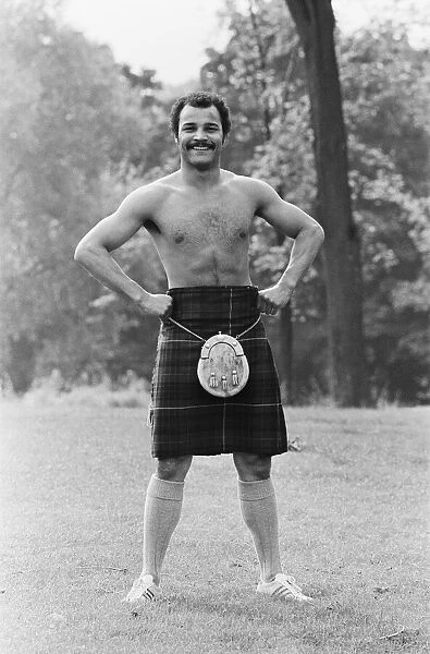 John Conteh gets the Scottish flavour on Parliament Hill Fields today watched by curious
