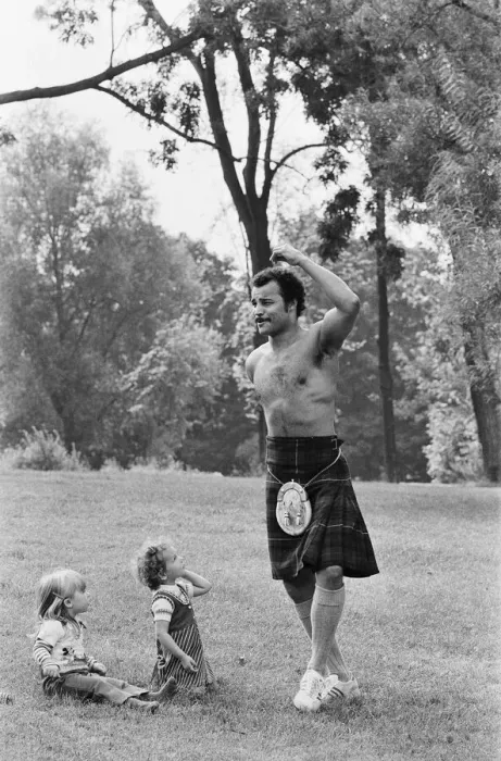 Framed Print : John Conteh gets the Scottish flavour on Parliament Hill Fields today watched by curious Framed Print : John Conteh gets the Scottish flavour on Parliament Hill Fields today watched by curious