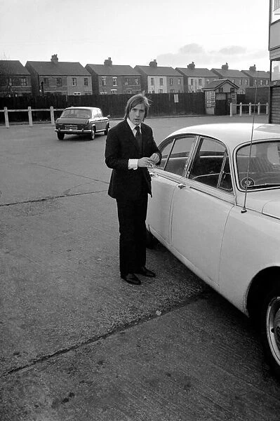 John Fitzpatrick, Manchester United half back arriving at Old Trafford to collect his car