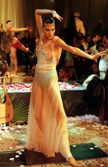 Framed Print : John Galliano fashion show Paris October 1998 Model wearing a cheer white Egyptian Framed Print : John Galliano fashion show Paris October 1998 Model wearing a cheer white Egyptian