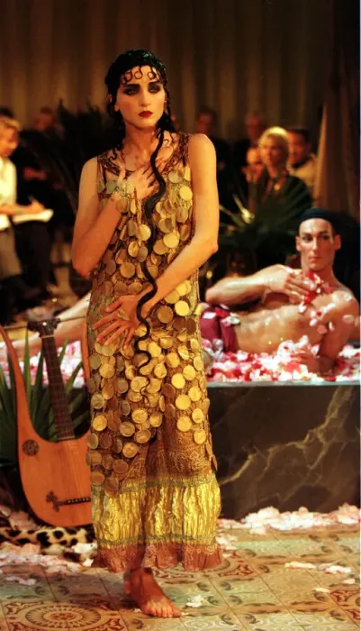 Framed Print : John Galliano fashion show Paris October 1998 Model wearing a patterned Egyptian Framed Print : John Galliano fashion show Paris October 1998 Model wearing a patterned Egyptian