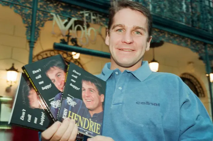 Framed Print : John Hendrie, Middlesbrough Football Player 1990-1996, pictured signing copies of his Framed Print : John Hendrie, Middlesbrough Football Player 1990-1996, pictured signing copies of his