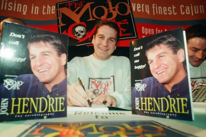 Framed Print : John Hendrie, Middlesbrough Football Player 1990-1996, pictured signing copies of his Framed Print : John Hendrie, Middlesbrough Football Player 1990-1996, pictured signing copies of his