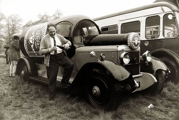 John Horton from Sussex standing beside a 1924 Daimler built in the shape of a bottle