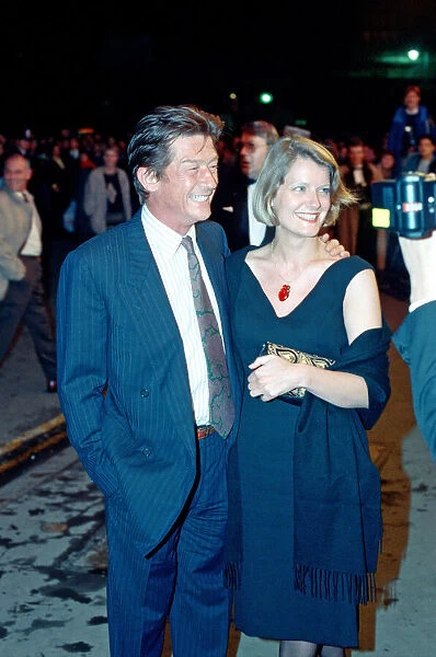 John Hurt and his partner Jo Dalton arrive at The Odeon Leicester Square