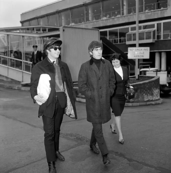 Framed Print : John Lennon and George Harrison of the Beatles pop group at the airport before leaving Framed Print : John Lennon and George Harrison of the Beatles pop group at the airport before leaving