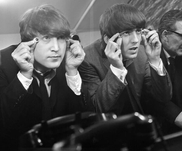 John Lennon and George Harrison with glass eyes when the Beatles