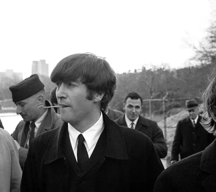 Framed Print : John Lennon in New Yorks Central Park, for a photocall on 9 February 1964
