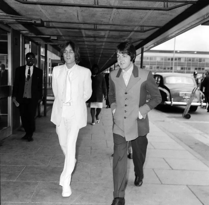 Framed Print : John Lennon and Paul McCartney fly from Heathrow Airport to New York to discuss