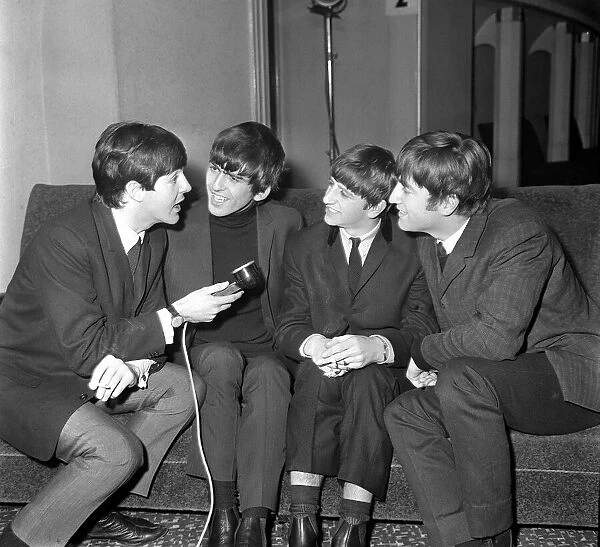 John Lennon, Paul McCartney, Ringo Starr, George Harrison The Beatles play at