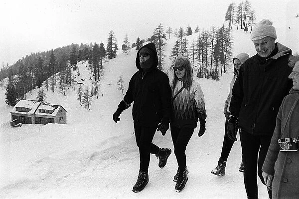 John Lennon and wife Cynthia Lennon in St Moritz on a Skiing Holiday with George Martin