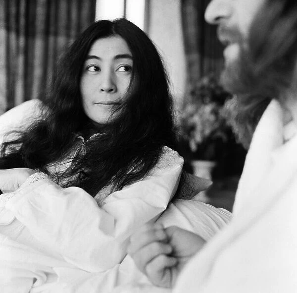 John Lennon and his wife Yoko Ono stage a bed in in a hotel in Amsterdam