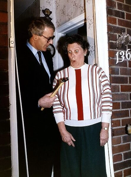 John Major British Prime Minister with Joyce Ball trying some DIY during the Conserve
