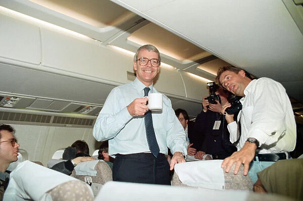 John Major during the general election campaign, pictured on an aeroplane. 8th April 1992
