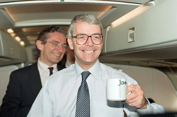 John Major during the general election campaign, pictured on an aeroplane. 8th April 1992