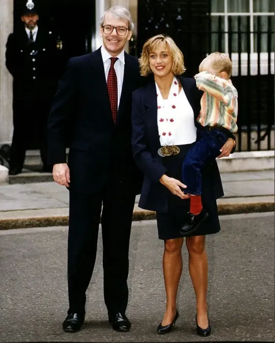 Framed Print : John Major is pictured outside No. 10 Downing Street this morning with three year old Framed Print : John Major is pictured outside No. 10 Downing Street this morning with three year old