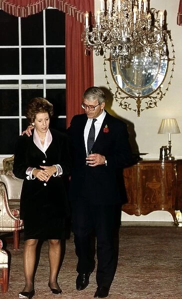 John Major with his wife walking through drawing room at 10 Downing Street