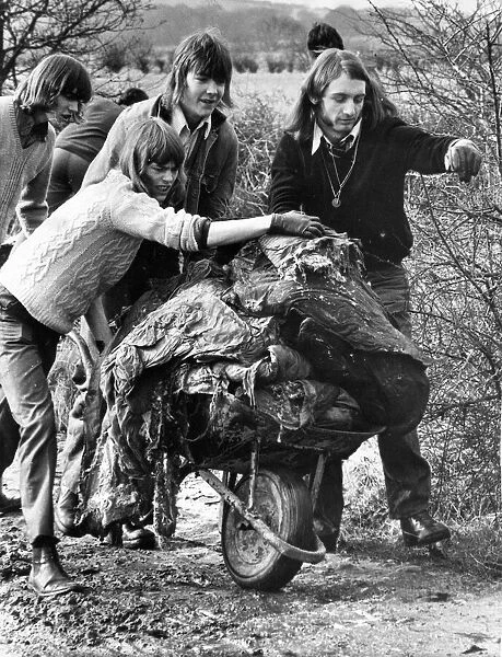 John Martin, Billy Stephenson and Bill Lane carting away dumped rubbish from a bridle