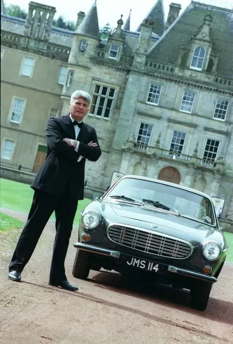 Framed Print : John Martin with P1800 Volvo car May 1998