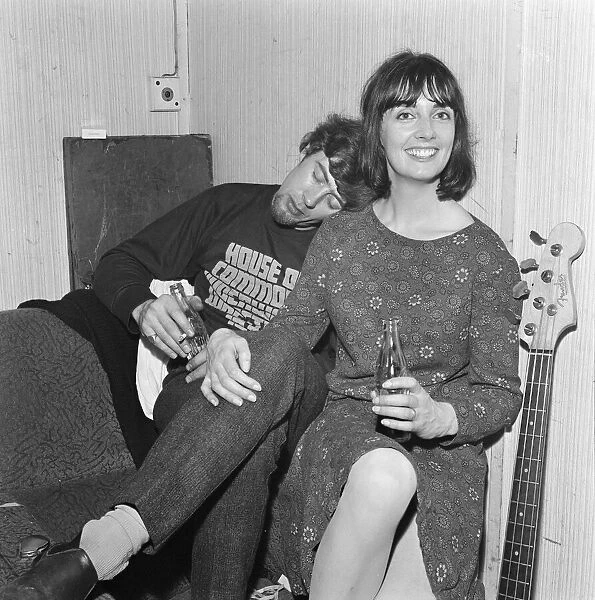 John Mayall of the Bluesbreakers, with wife Pamela, rests in the band room between