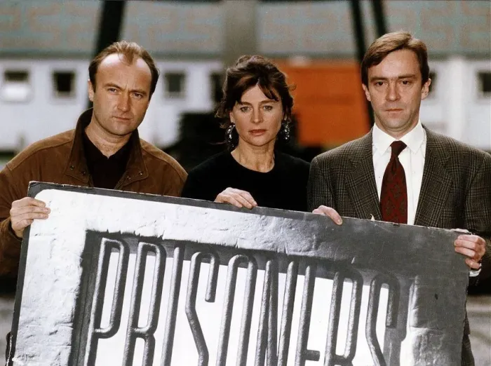 Framed Print : John McCarthy former hostage with Phil Collins and Julie Christie at launch of new tv