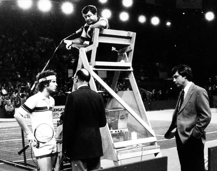 Framed Print : John McEnroe at Wembley 1979 having a discussion with the umpire