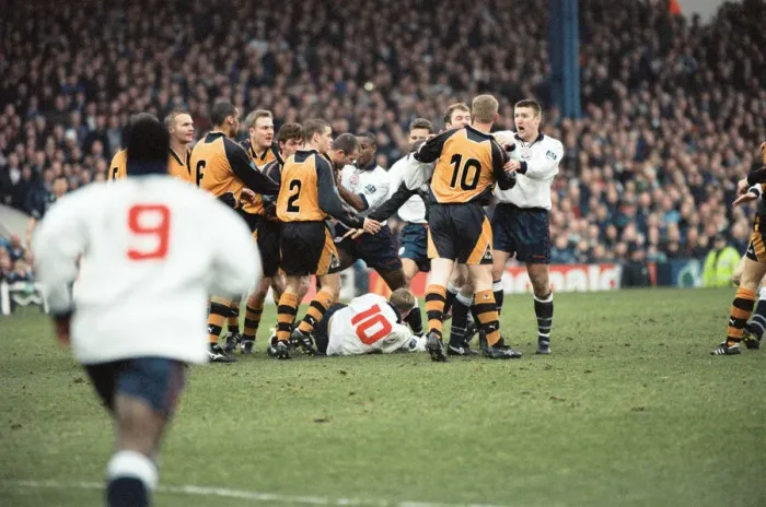 Framed Print : John McGinlay Bolton Wanderers is floored after a 22 man fight broke out during match