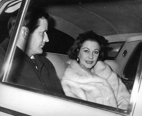 JOHN MERIVALE WITH VIVIEN LEIGH DRIVEN AWAY FROM OPERA - 19TH FEBRUARY 1965