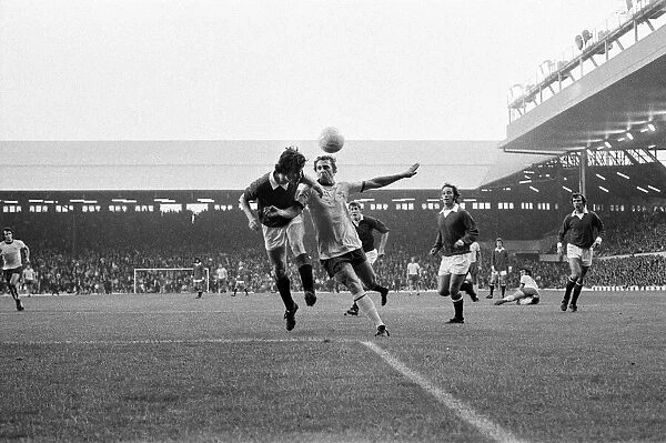 John Radford (right) of Arsenal is beaten to the ball by a Manchester United defender