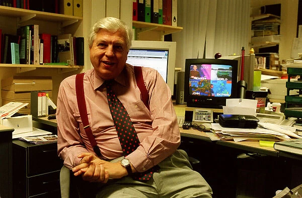 John Simpson News Reporter November 98 Sitting at his desk working