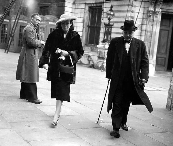 John Spencer Churchill walking down the street with his wife Clarissa