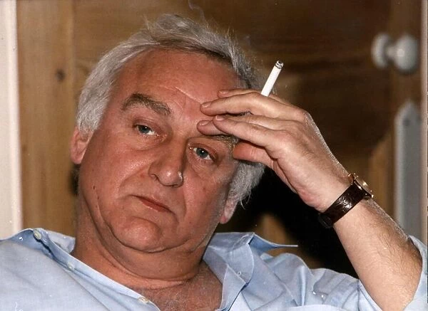 John Thaw actor at home smoking a cigarette, He has starred in such TV programmes