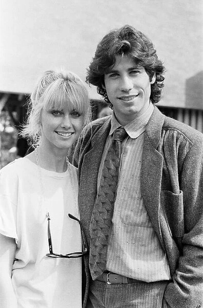 John Travolta and his co star Olivia Newton John in England during the week of release of