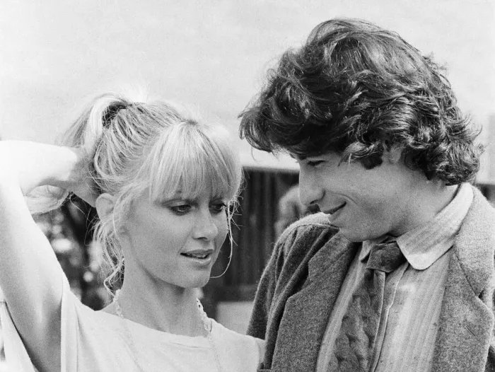 Framed Print : John Travolta and his co star Olivia Newton John in England during the week of release of