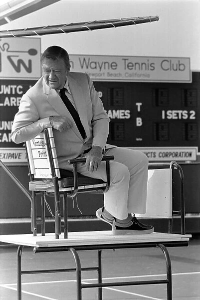 John Wayne who stars in Brannigan. Seen here at his tennis club